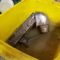Heater Parts in Vinegar Soak Bucket